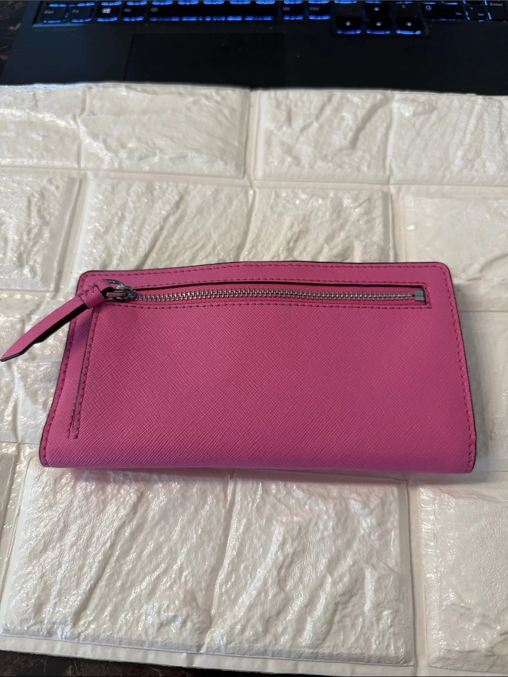 Kate Spade New York Large Slim Bi-Fold Wallet Fuchsia Color